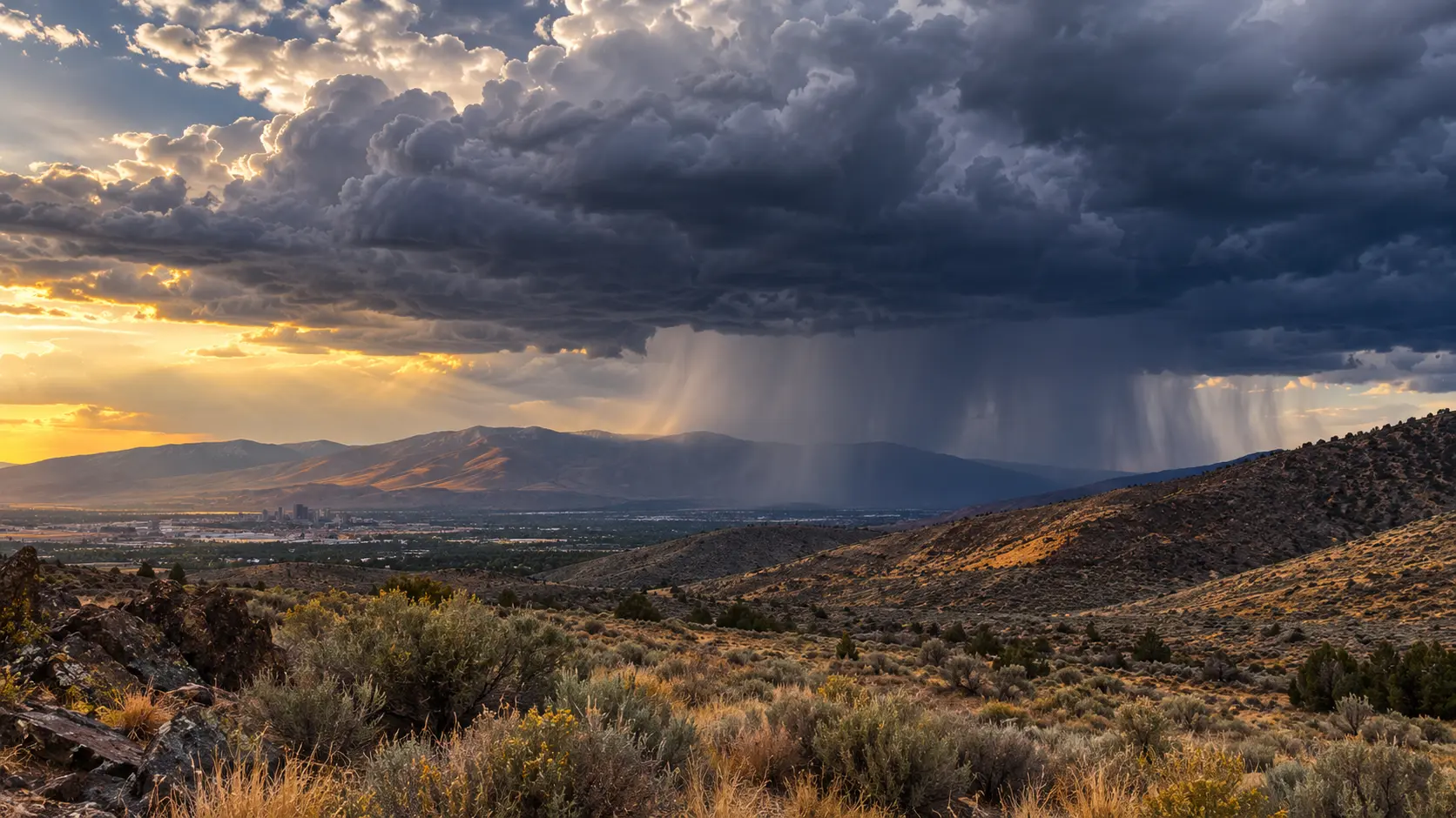 Dark thunderstorm clouds building over high desert hills near Reno, Nevada