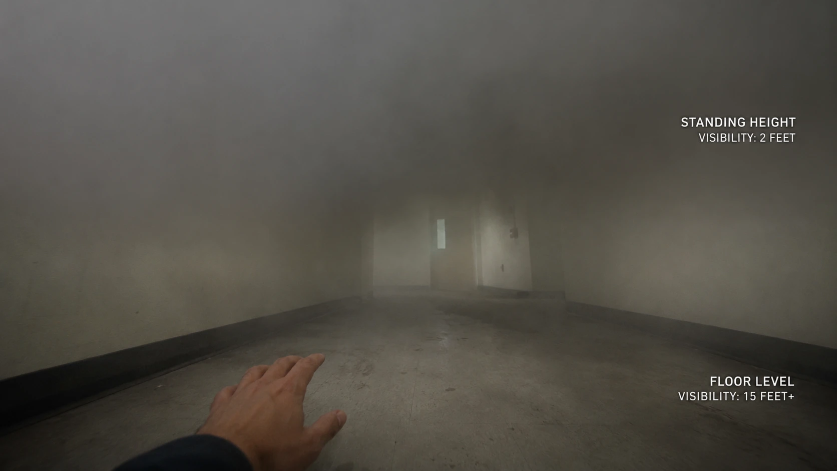Smoke-filled house hallway showing near-zero visibility conditions that disorient occupants and make standing upright and navigating by sight impossible