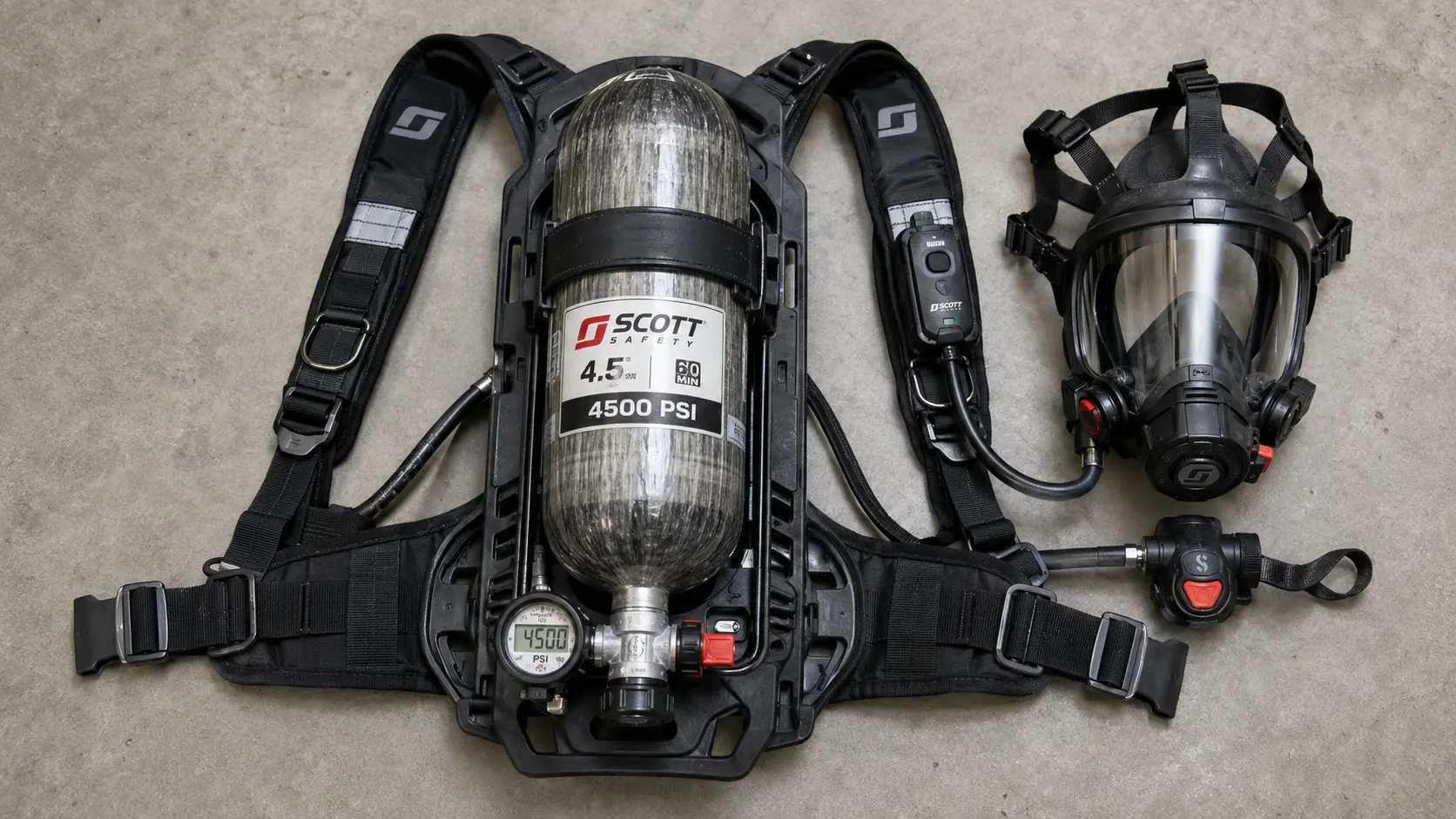 Photorealistic close-up studio photo of a complete SCBA unit laid out on a flat surface showing all four main components clearly labeled by position: the black composite cylinder with pressure gauge showing 4500 PSI, the black backframe and harness assembly with waist and shoulder straps, the demand valve regulator with low-pressure hose and connection fitting, and the full-face mask facepiece with head harness, integrated PASS device visible on the shoulder strap of the backframe &mdash; all components of a modern self-contained breathing apparatus used by firefighters